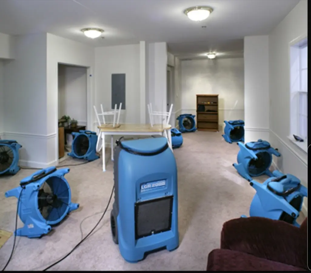 Air movers and dehumidifier setup for Water Damage Restoration in Brecksville